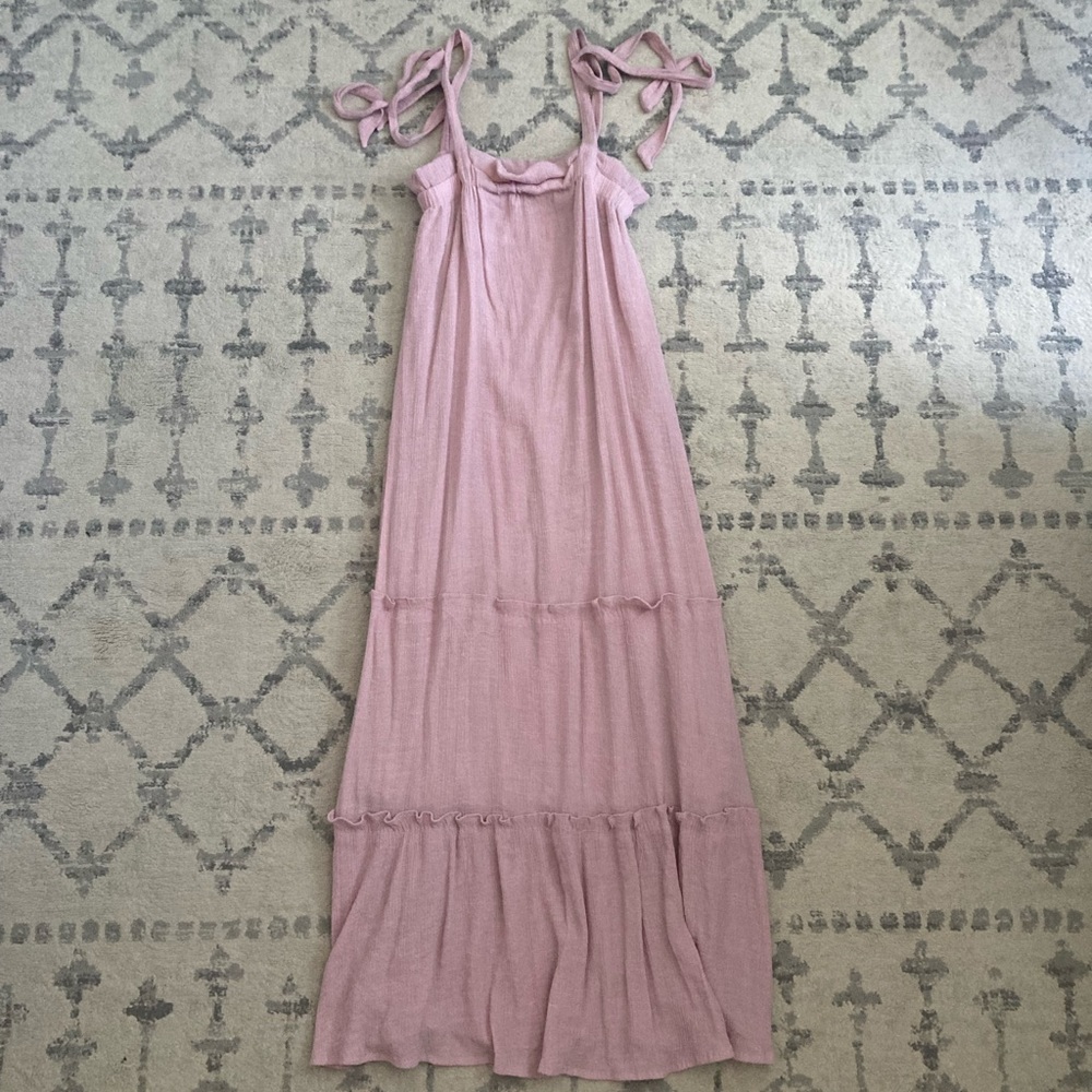 Spaghetti strap long maxi dress. Ties into bow on sleeves.
